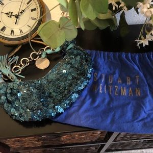 Free Stuart Weitzman evening bag.